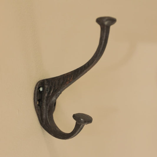 Authentieke zwarte kapstokhaak met 4 oogjes om het aan de wand te hangen.